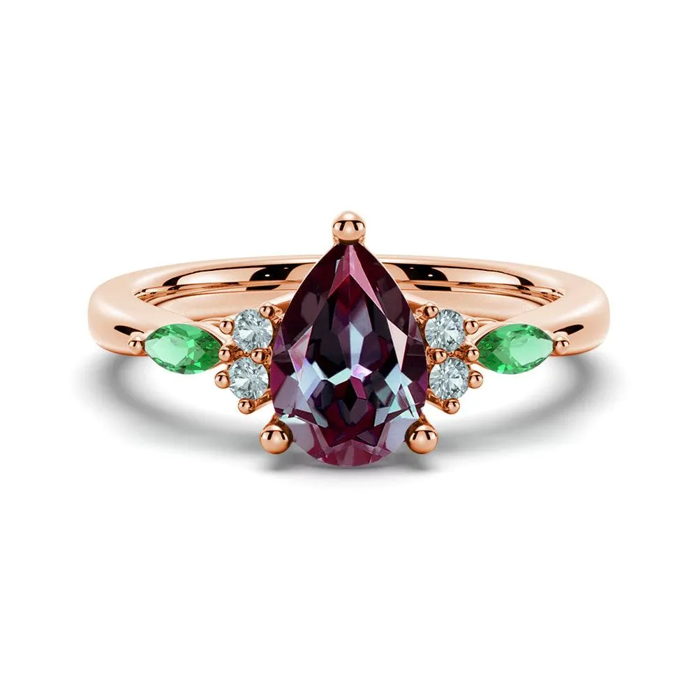 1.5 CT. Pear Shaped Alexandrite Engagement Ring With Emerald Accents