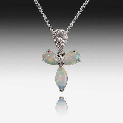 18KT WHITE GOLD OPAL AND DIAMOND CROSS