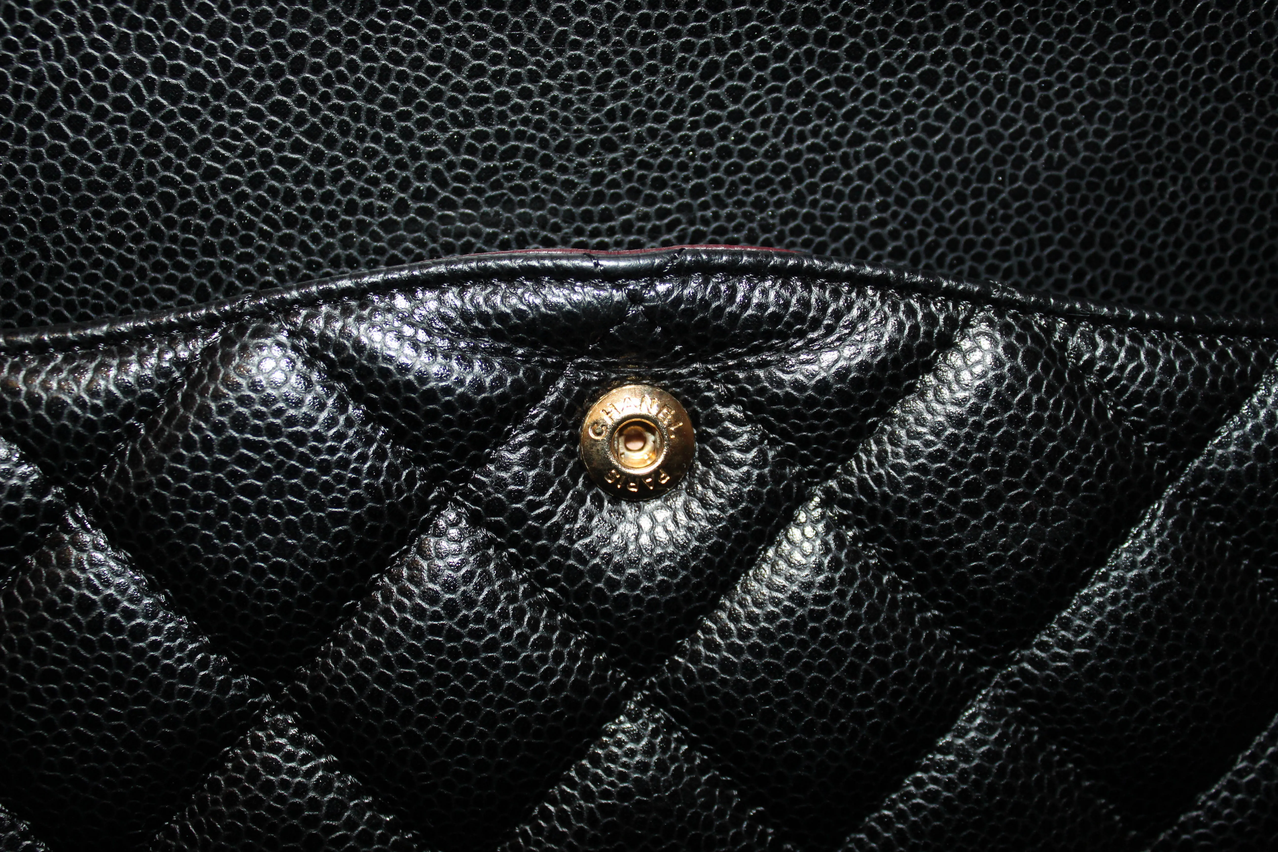 Authentic Chanel Black Quilted Caviar Leather Maxi Double Flap Bag