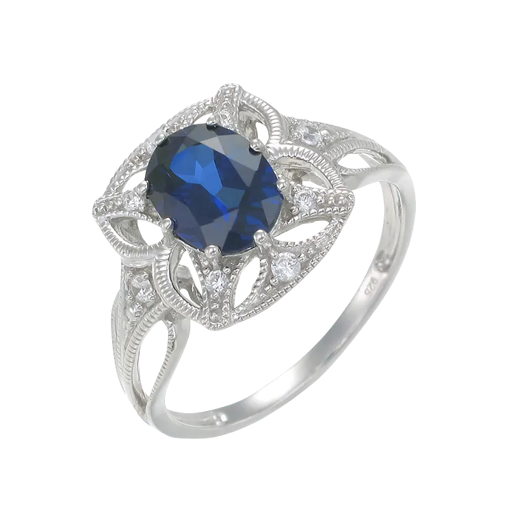 Graceful Blue Sapphire Ring with Filigree Detail