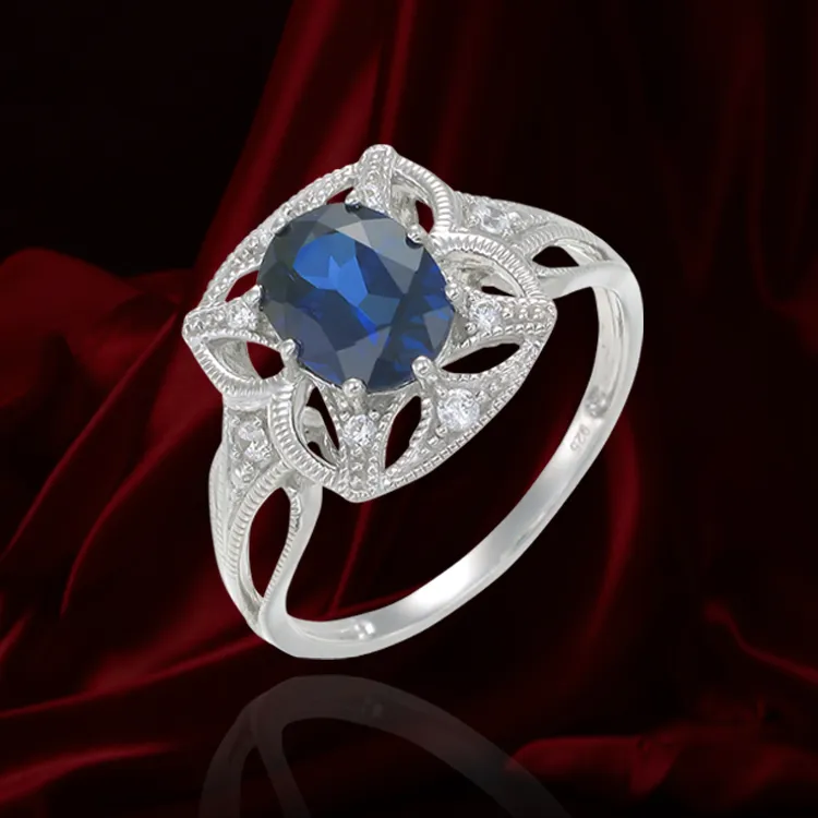 Graceful Blue Sapphire Ring with Filigree Detail